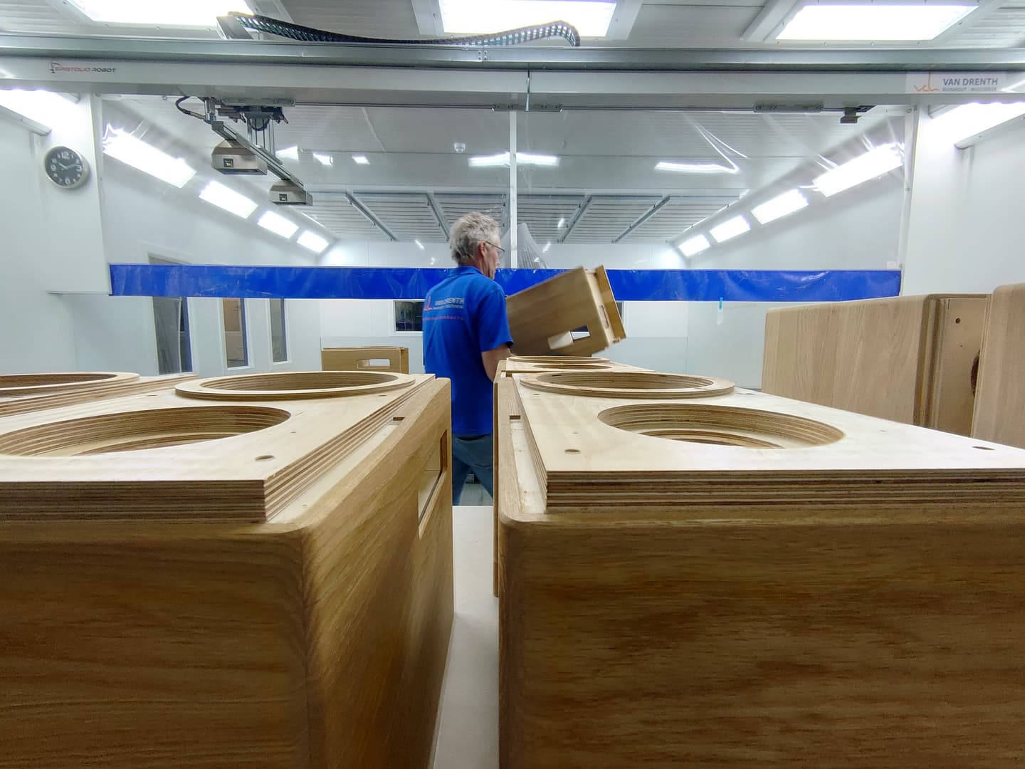 A calibrated listening room with measurement equipment visible